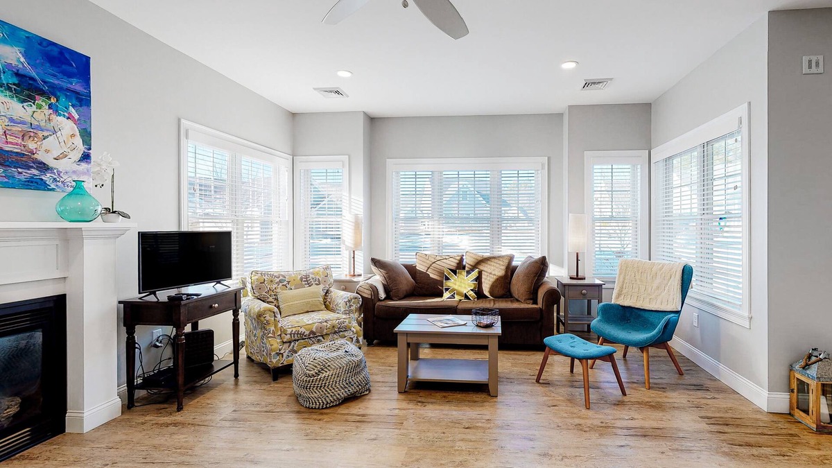 Arundel Condo | Two stroy condo with heated pool, gym, private patio, gas fireplace, W/D, AC
