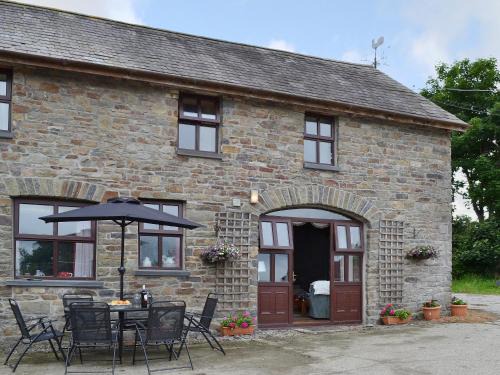 Dihewid House | Ty Coch Cottage