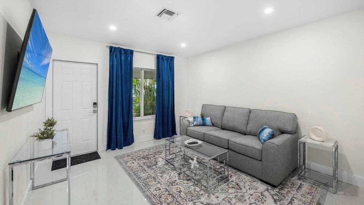 Downtown Fort Lauderdale Apartment | Uhost AI | 1BR Oasis | Modern Design & Patio