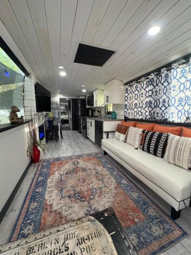Clermont Villa | Unique Adventure Awaits in This Custom Tour Bus Conversion!