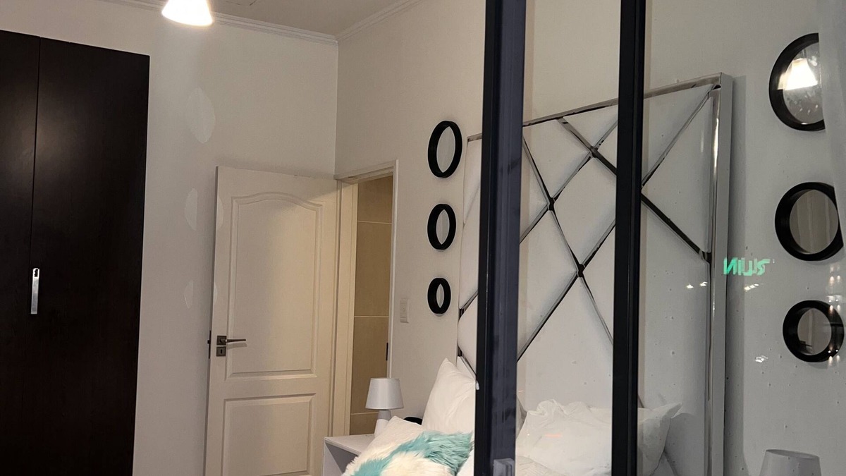 Greater Johannesburg Metropolitan Area Apartment | Unique and comfortable accommodations in the heart of our vibrant city.