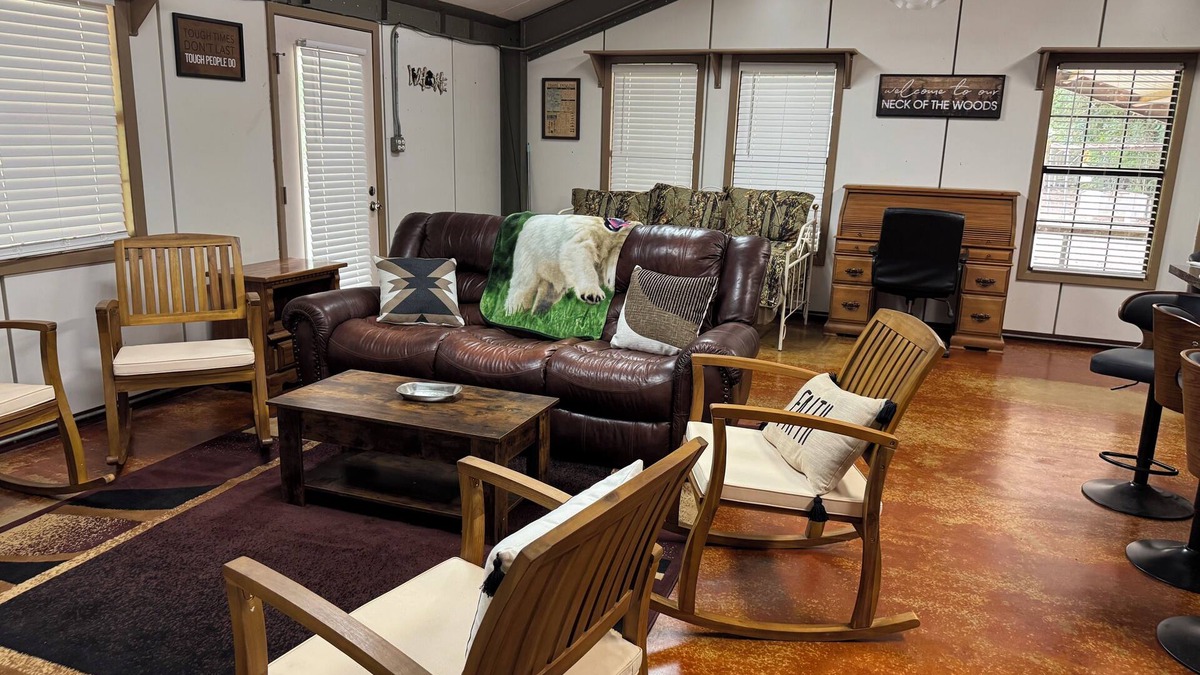 Fairbanks House | Unique camp style house with large wrap around deck.