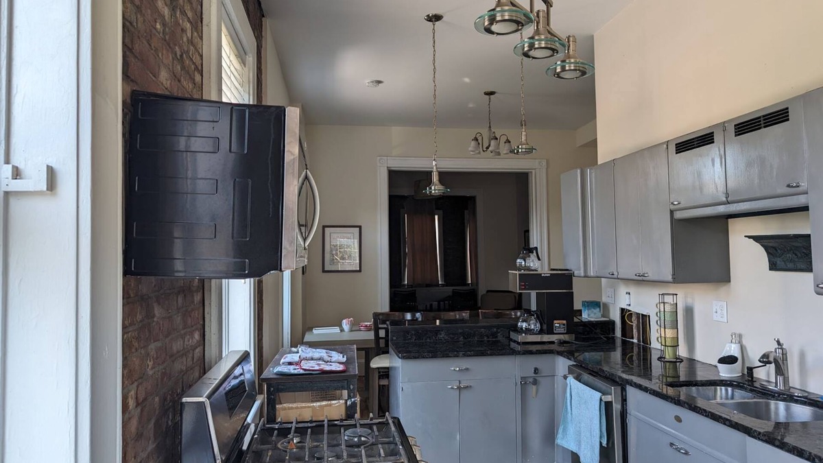 The Gate Apartment | Unique Condo in Historic Building with Rooftop Deck.