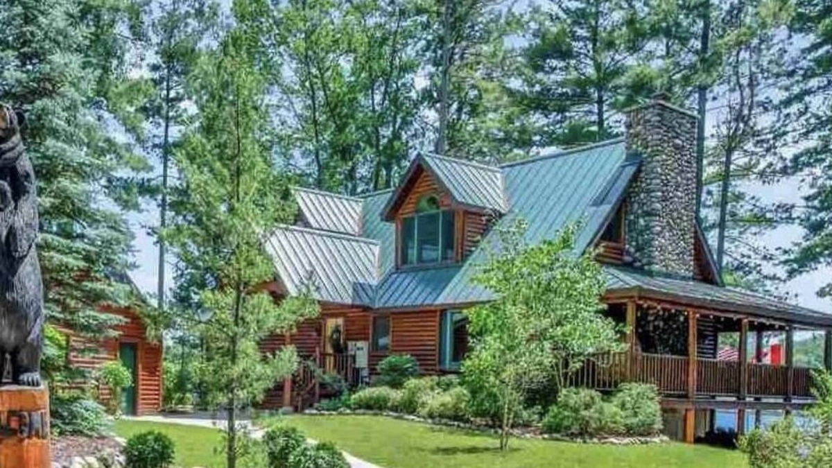 Long Lake House | Unique log cedar family vacation home with 185 feet of secluded lake frontage