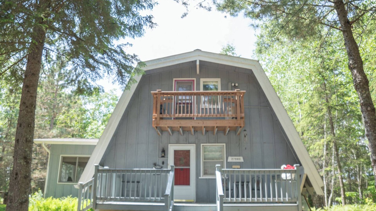 Bigfork Cabin | Unique modified A-frame cabin with loft, sandy lakefront, and amenities of home.