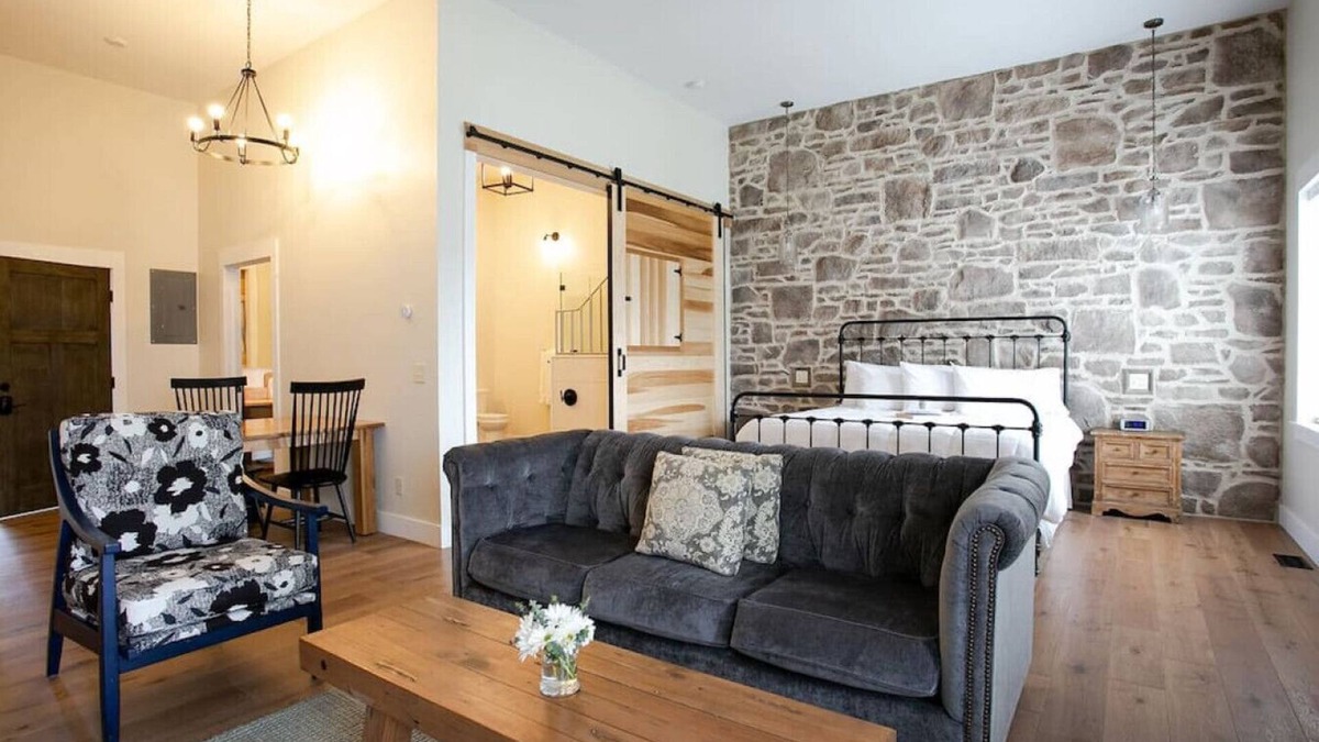 Millersburg Apartment | Unique Rustic Suite with Jacuzzi Tub, Kitchen, Fireplace, and Living Room