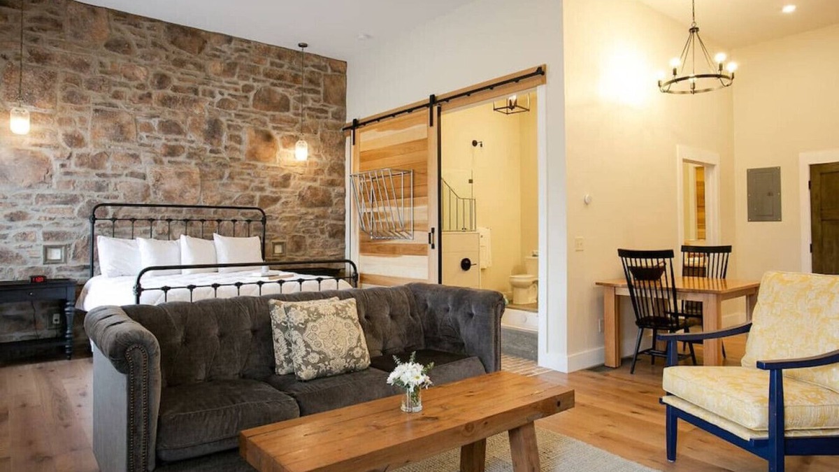 Millersburg Apartment | Unique Rustic Suite with Jacuzzi Tub, Kitchen, Fireplace, and Living Room