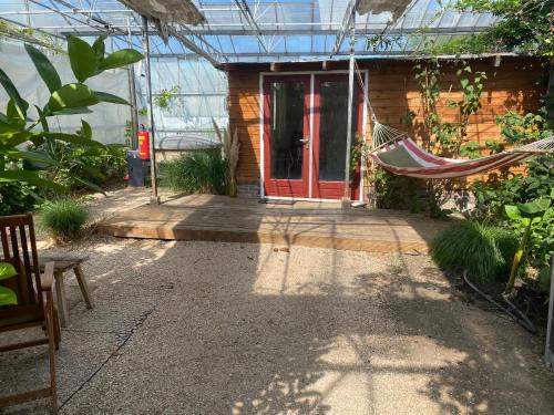 Rijsenhout Ski Chalet | Unique Tiny House close to Ams Airport with Hottub