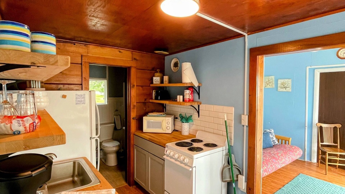 Oscoda Resort | Unit #2-The Lazy Fish one queen bed, full bathroom and renovated kitchen.