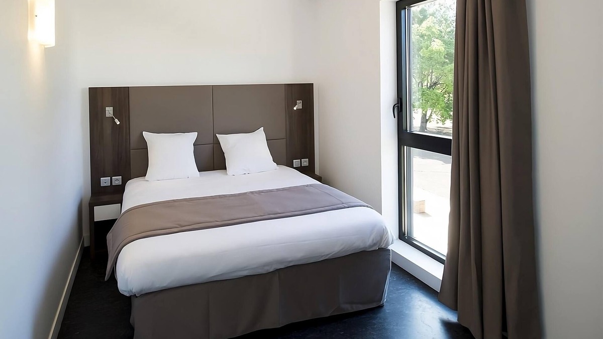 Dijon Hotel | Unwind in a Comforting Room with Nearby Tram to City | Free Offsite Parking