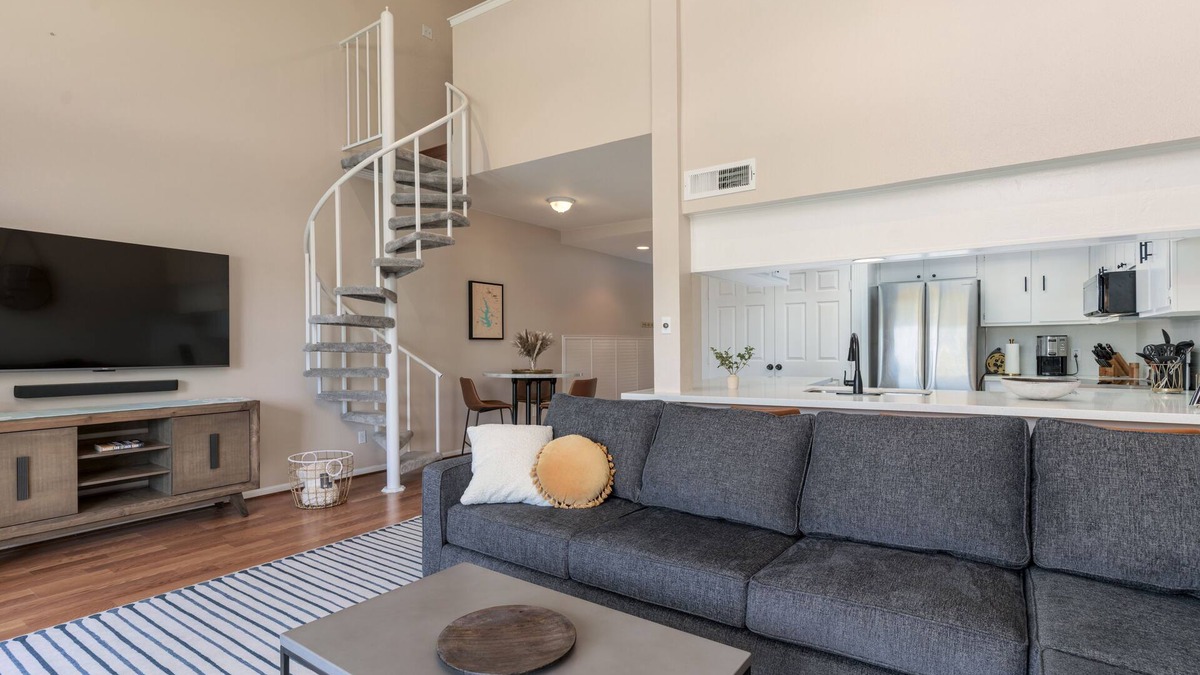 April Sound Condo | Updated Boho condo, dock your boat or enjoy the Conroe Lake views from your deck