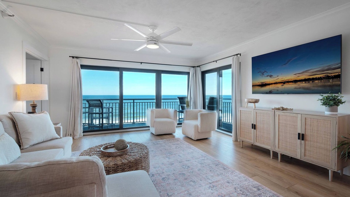 New Smyrna Beach Condo | Updated direct oceanfront condo with spacious balcony, heated pool and beach access