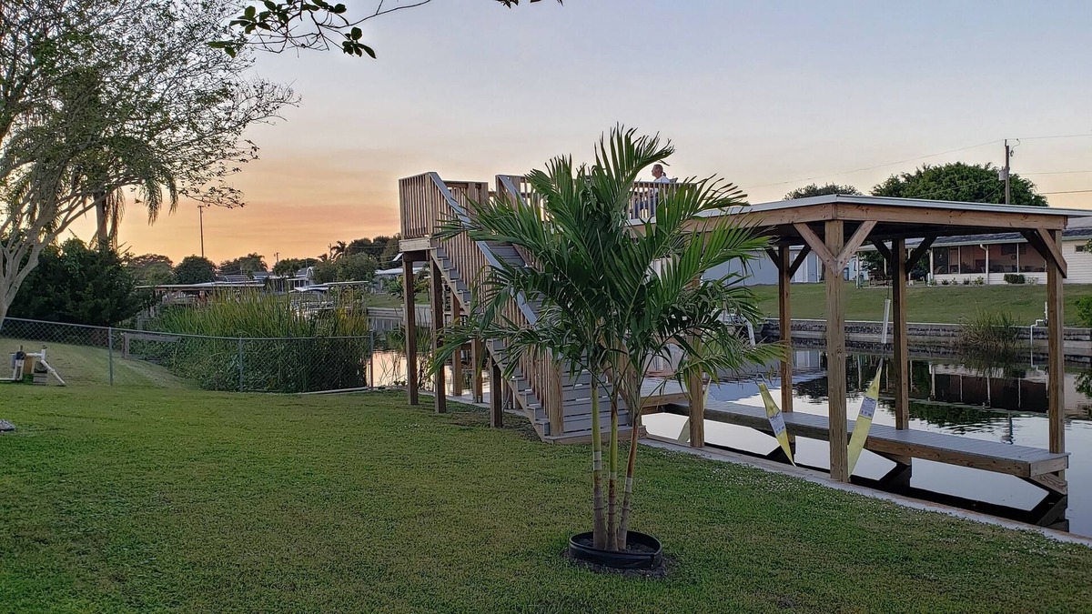 Taylor Creek House | Updated home in quiet area. Dock, fish cleaning station & more. Lake O Access!