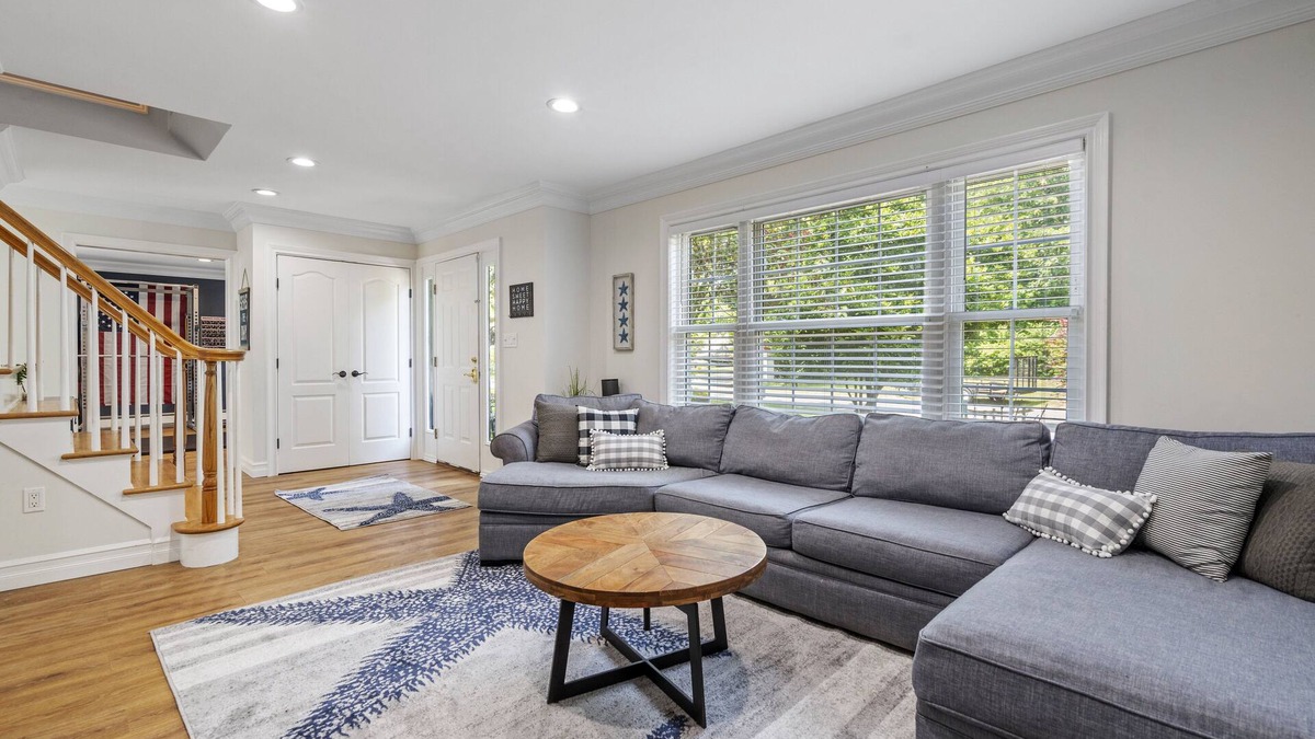 Oakdale House | Updated home with canal & hot tub in backyard. Close to everything!
