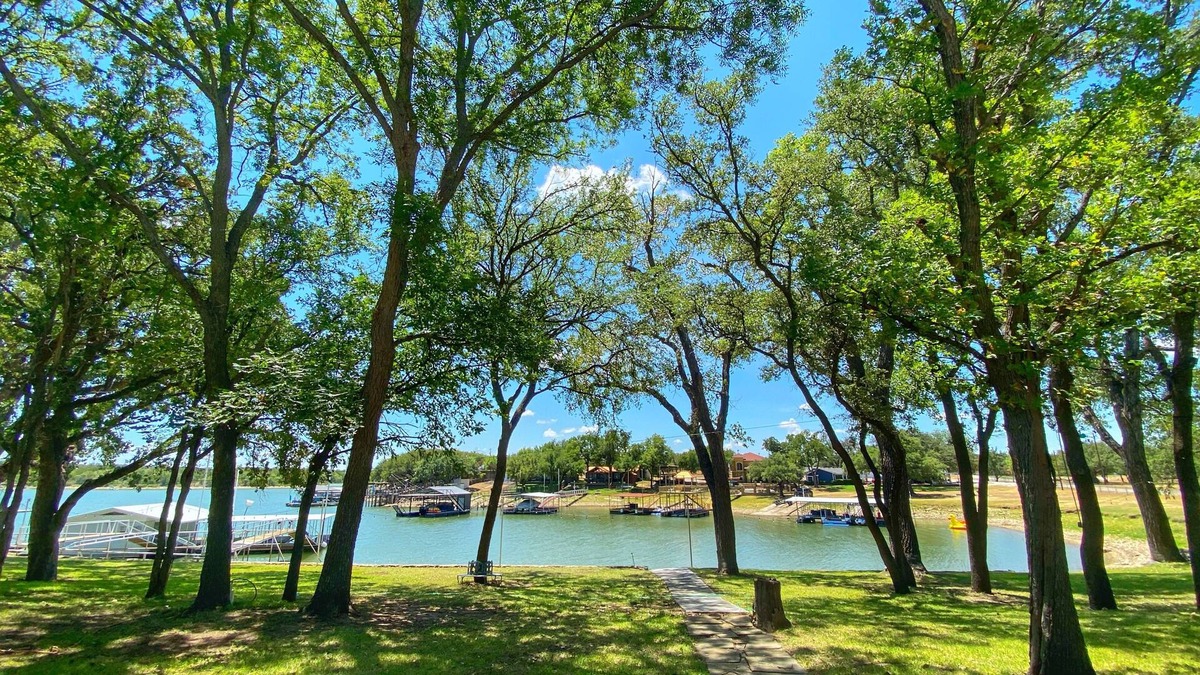 Brownwood House | Updated Shady Lakeside Retreat on Lake Brownwood with Large Boat Dock