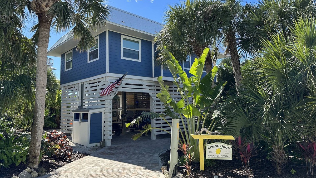 North Captiva House | Upgraded beach house located just steps away from the beach. Pool and Hot tub.