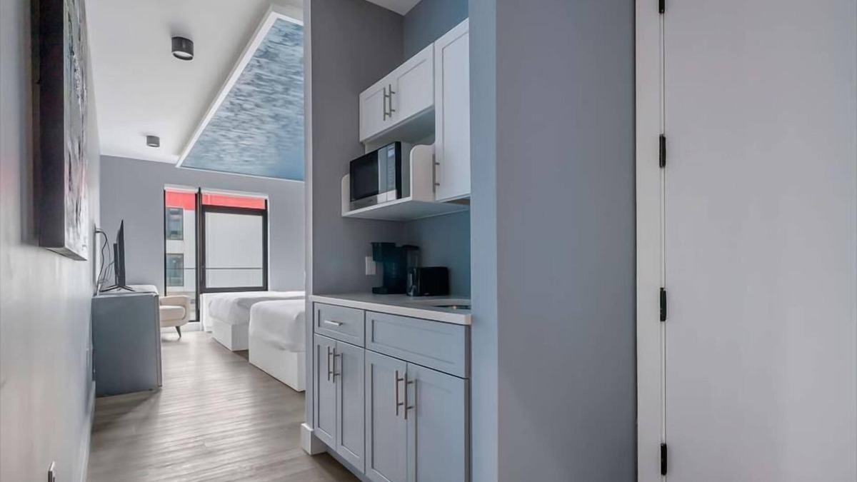 Mott Haven House | Upscale Double Queen Suite | Mott Haven | Fitness Center | Free WiFi