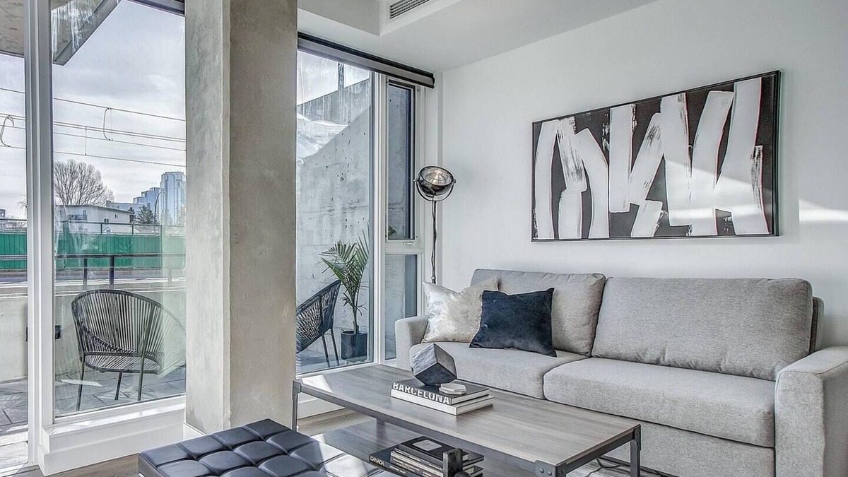 Sunnyside Condo | Upscale Industrial Condo with Patio near LRT