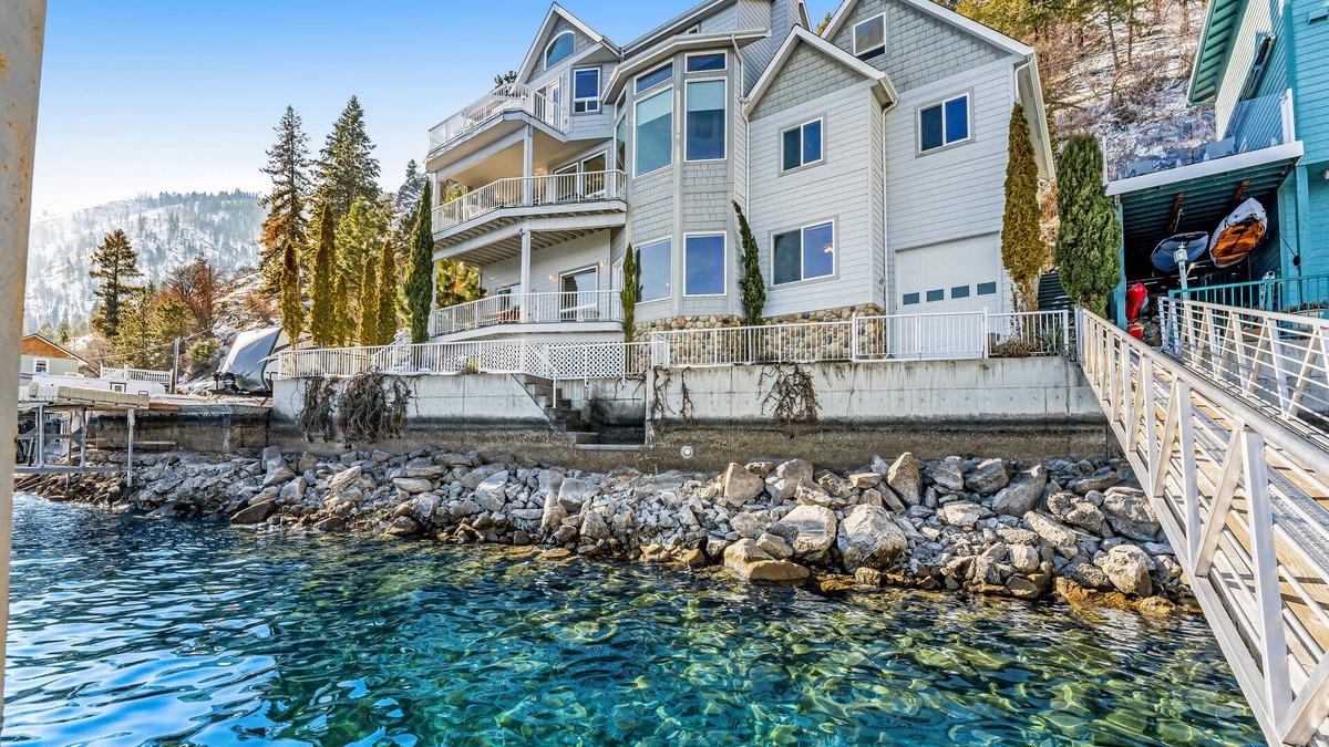 Manson House | Upscale lakefront house with stunning views & dock spacious interior with fireplace