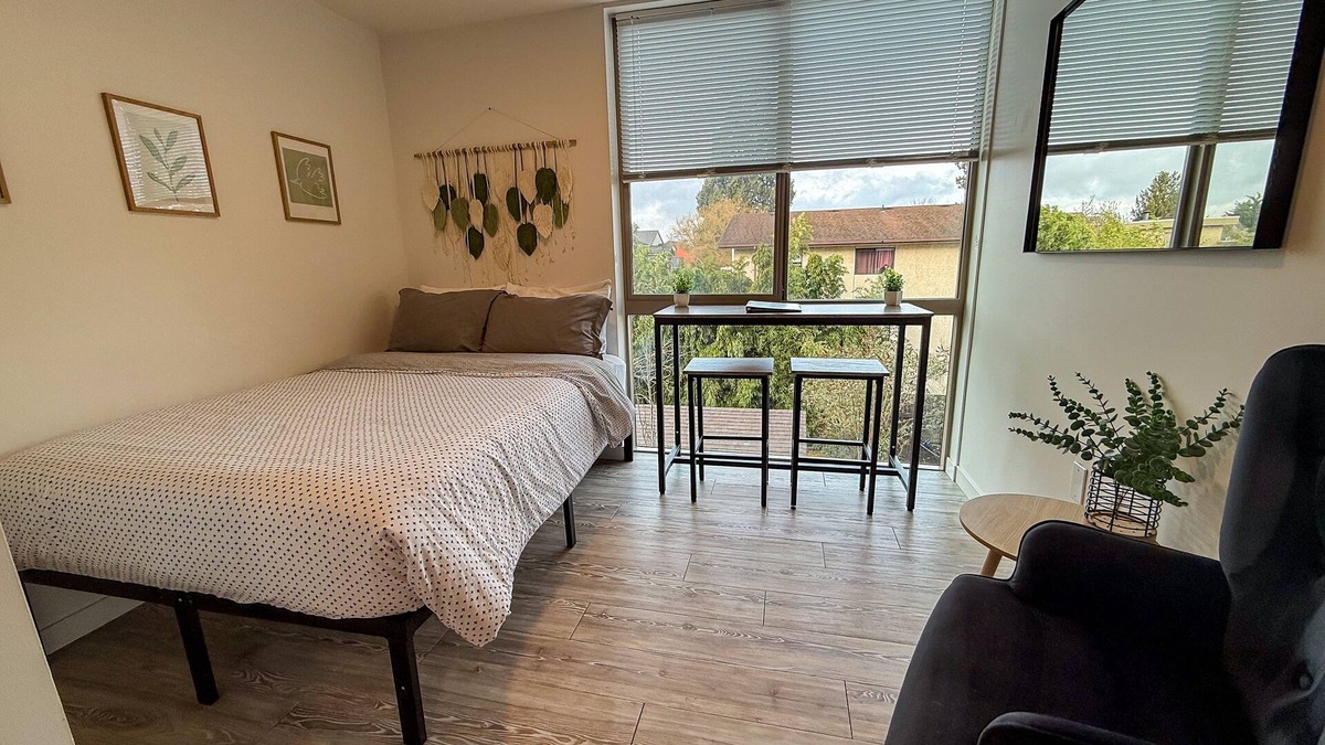 Old Ballard Apartment | Urban studio unit with patio views, shared lounge space and dedicated workspace