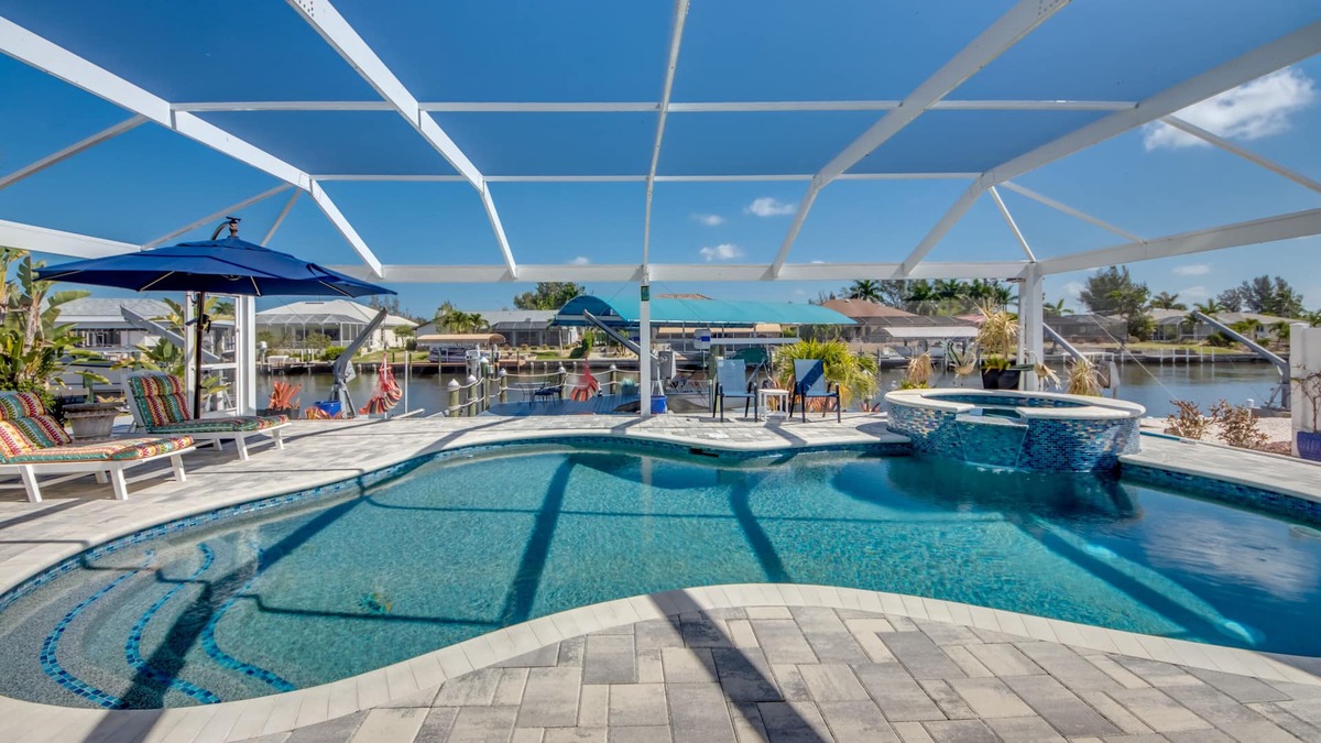 Matlacha Isles Villa | Fun'n Sun-Charming 3 BR/3 baths waterfront villa- pool, spa, dock, fishing poles