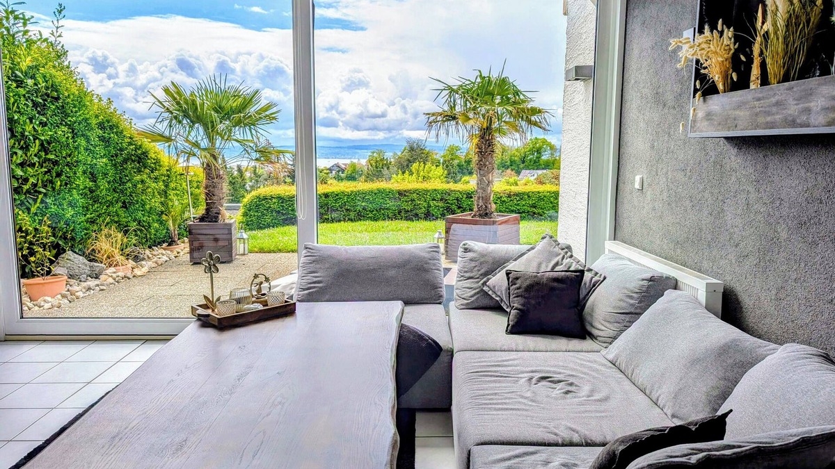 Daisendorf Apartment | Vacation apartment with a view of Lake Constance under palm trees