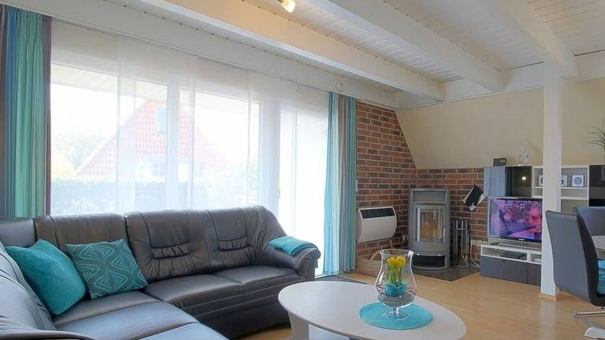 Dorumer Neufeld House | Vacation home "Buß" on the North Sea coast, vacation directly behind the dike!