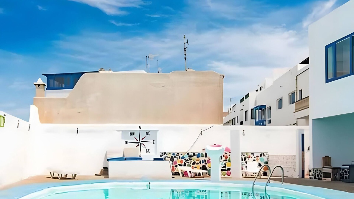 La Santa House | Vacation Home 'La Santa' with Sea View, Shared Pool and Wi-Fi