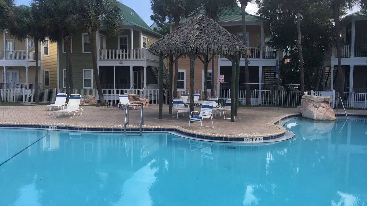 Ono Island Condo | Vacation Paradise at Purple Parrot Resort Relax at the Tiki Bar New on