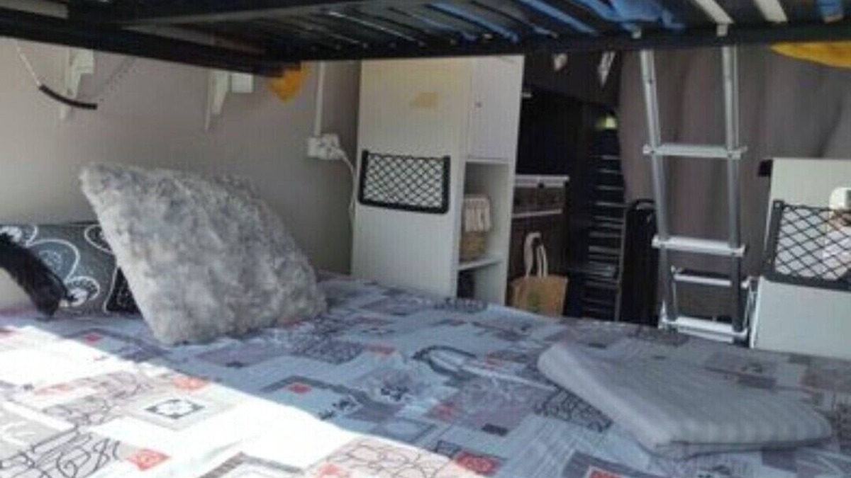 Millenaire House | Van set up in a PUBLIC parking lot that's good for repairs