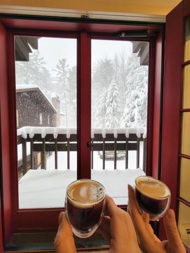 Winhall Ski Chalet | Vermont Escape near Stratton with Hot Tub, Game Room, Fireplace & Pond Views