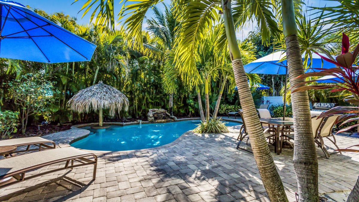 Holmes Beach Cottage | Vibrant Island Retreat with Pool, Tiki Table and Walk to Beach