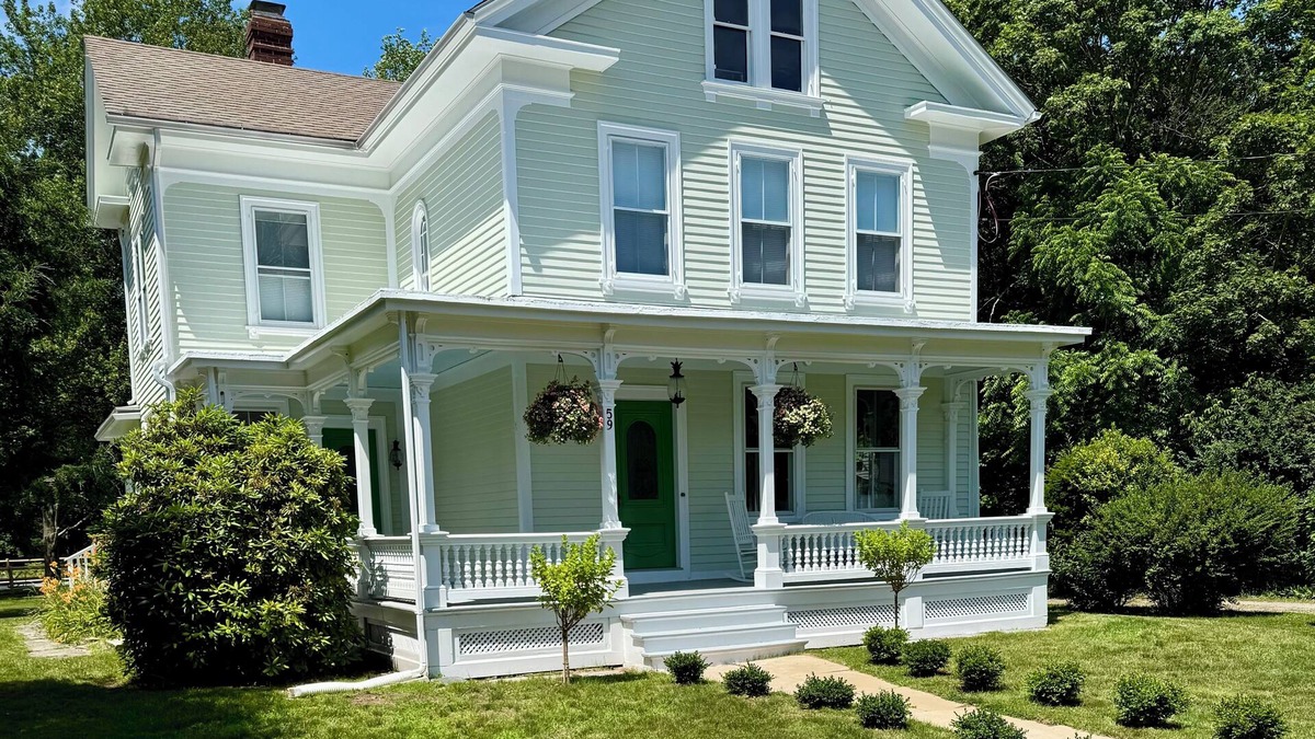 Westbrook Center House | Victorian beach house and cottage family compound with large pool in Westbrook