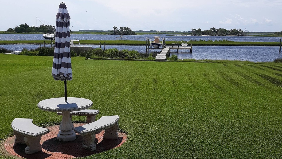 Hubert Apartment | View of intracoastal waterway with private dock and boat lift.