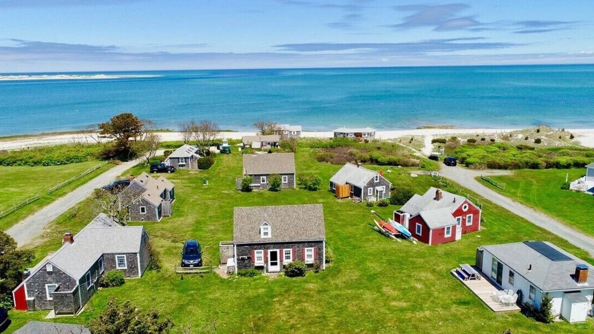 Barnstable Cottage | Views across Barnstable Harbor from the deck of this 2 br cottage with access to Association beach.