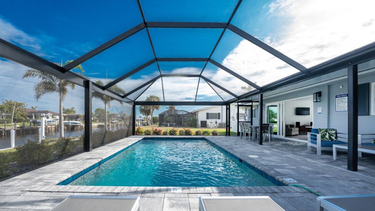 Punta Gorda House | Villa Capri | Waterfront Luxury Retreat Heated Saltwater Pool Dock