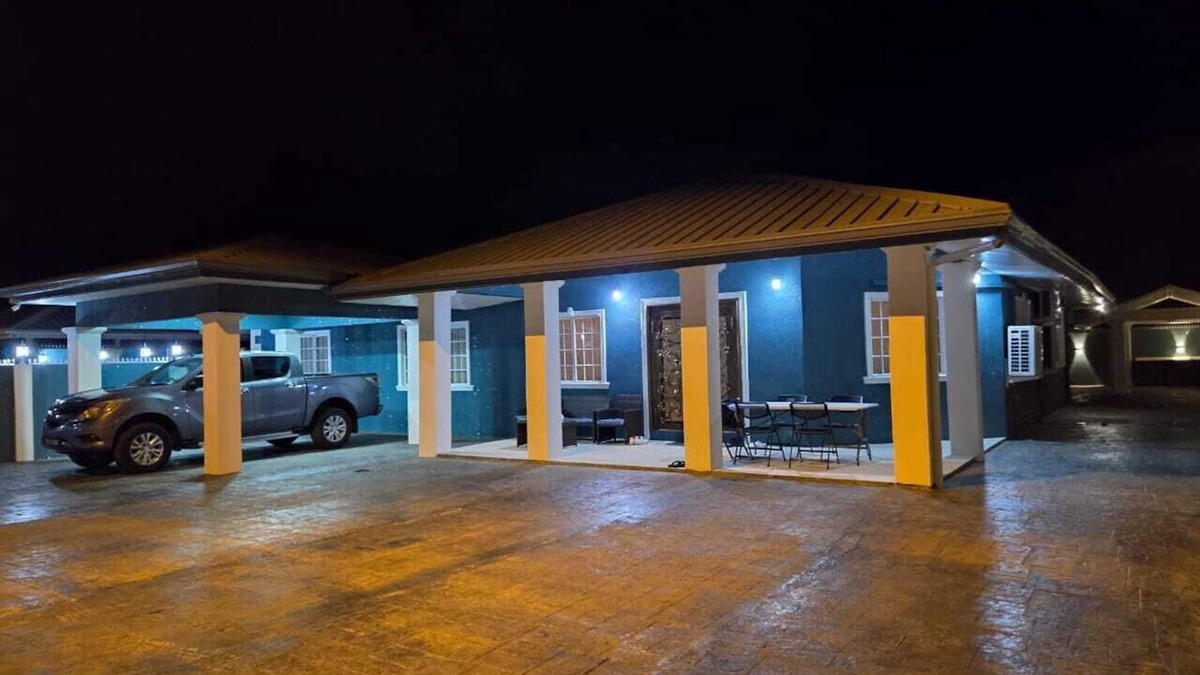 Crown Point Villa | Villa Flores- New Modern Luxury Villa within walking distance from ANR Airport.