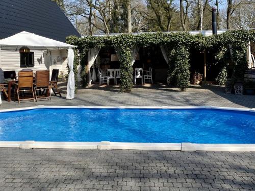 Wateren House | Villa in Drents-Friese Forest with Pool