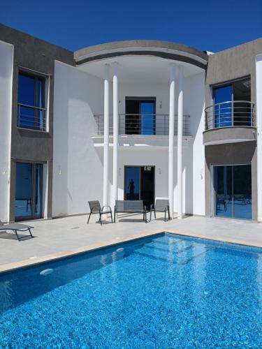 Triffa Villa | Villa Olivier rond point du rendez-vous, Midoun