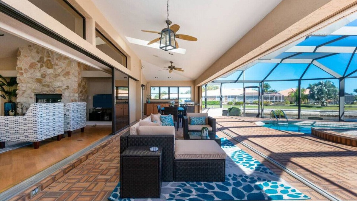 Punta Gorda House | Villa Tropical | Waterfront Luxury in Punta Gorda Heated Pool Spa Dock