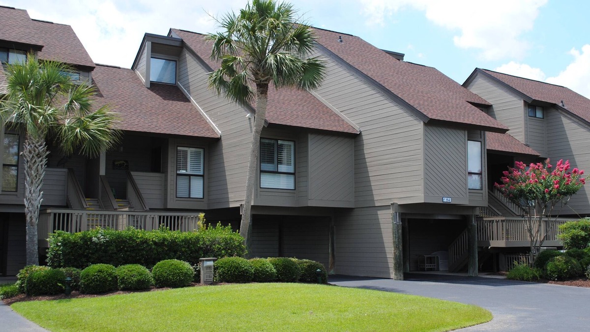 Litchfield by the Sea House | Villa with marsh views and pool access located within gated Litchfield By the Sea community.