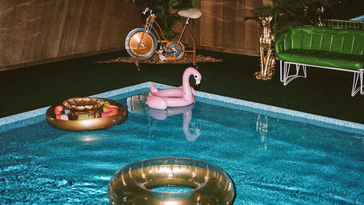 Stanchfield House | Vintage kitsch 70s/80s themed house with indoor pool and backyard creek