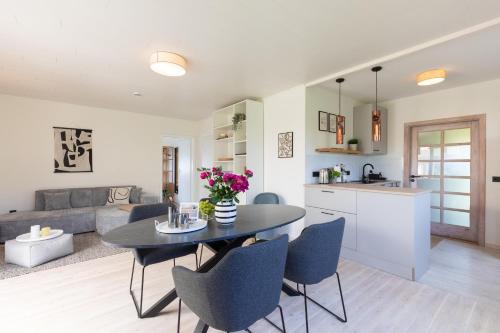 Westerholz House | VITA Sonnholm - modernisiertes Häuschen mit Garten am Meer