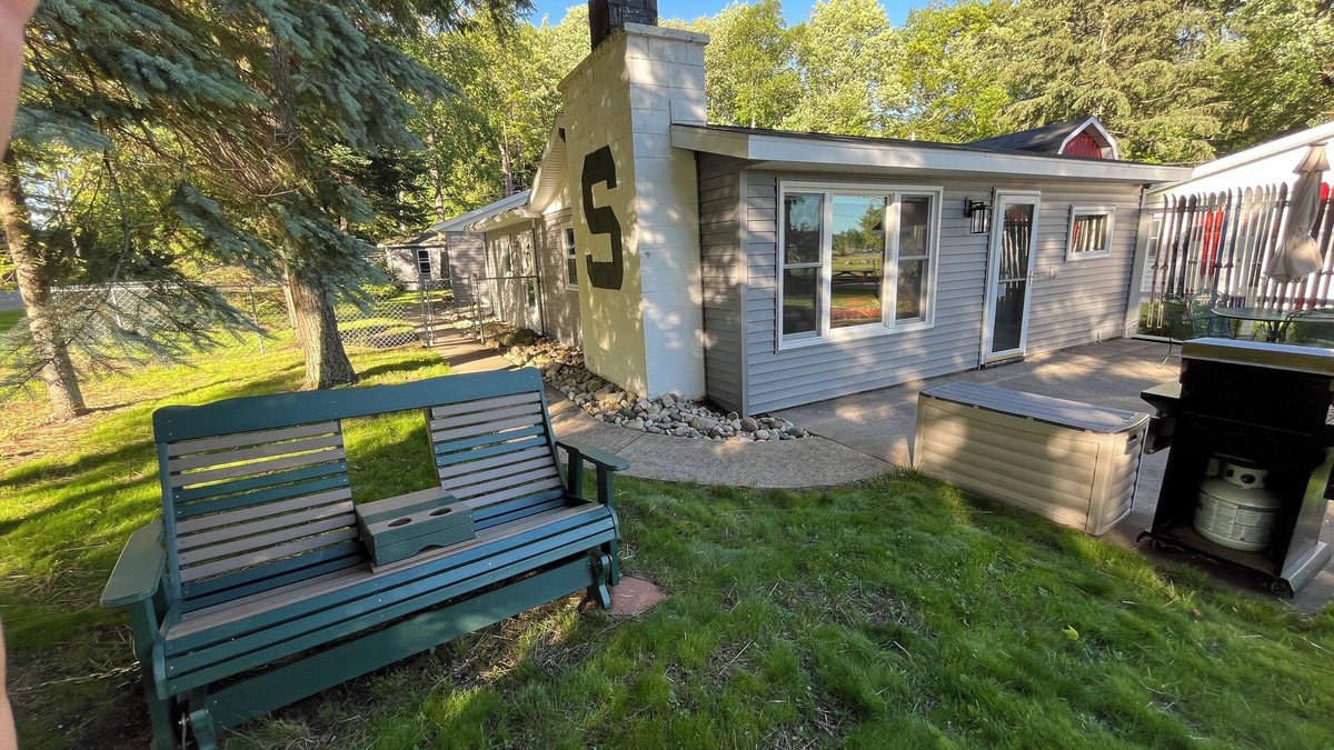 Cadillac Cottage | W Lake Mitchell. Private shared frontage. Quiet side of lake. ORV trail access.