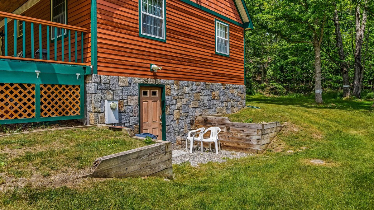 North Lake George Apartment | Walk-out apartment near lake & town with spacious yard, washer/dryer & fireplace