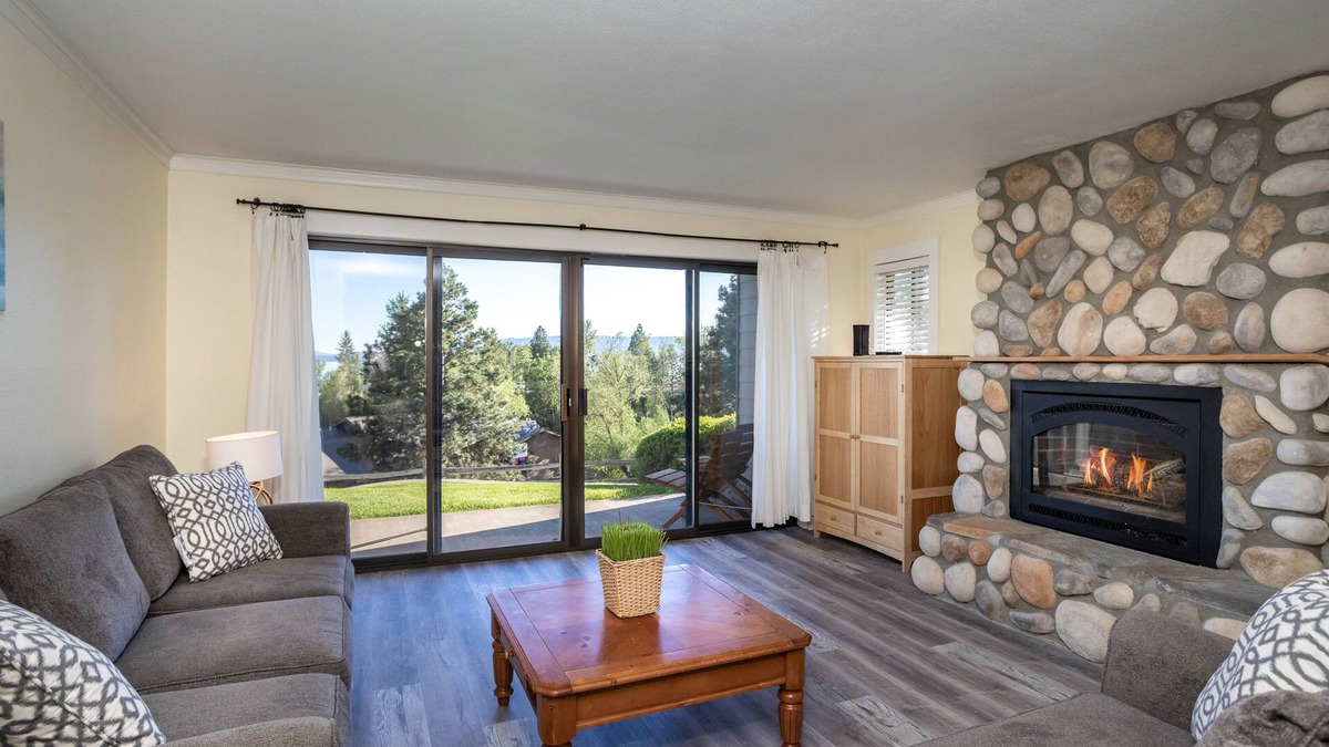 Bigfork Condo | Walk-out patio, lake Access and fireplace - Updated Marina Cay Oasis