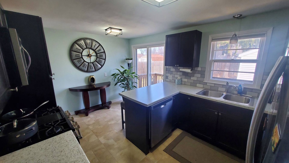 Green Bay House | Walk to Lambeau! Spacious home with fenced in yard