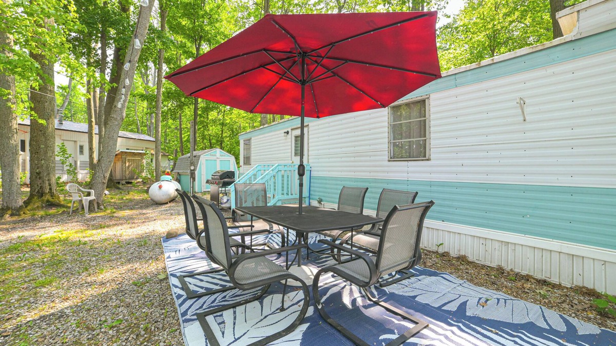 Kalkaska House | Walk to Manistee Lake: Retro Cottage w/Fire Pit!