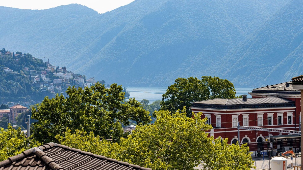 Lugano Apartment | Walking distance to the Station with mountain and city views
