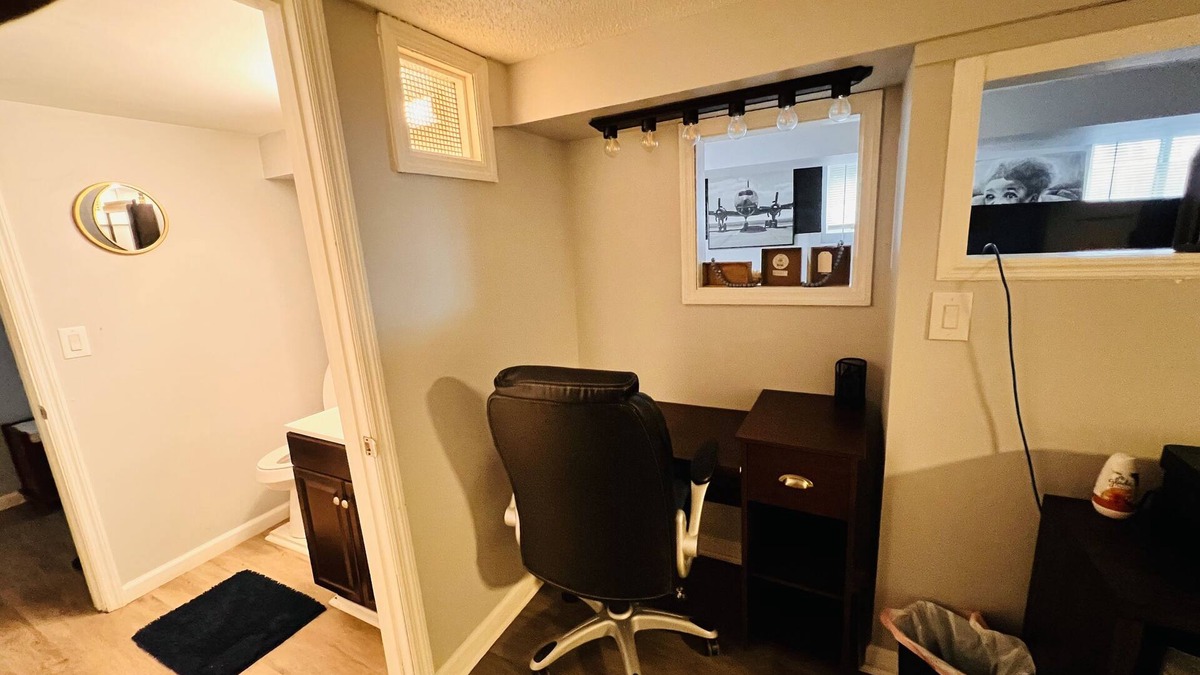 Troy House | Warm and cozy basement.